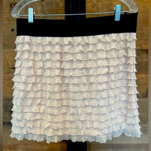 FREE PEOPLE Ruffle Mini skirt. Nude/Beige/Cream Tier Ruffle Mini. Size LARGE